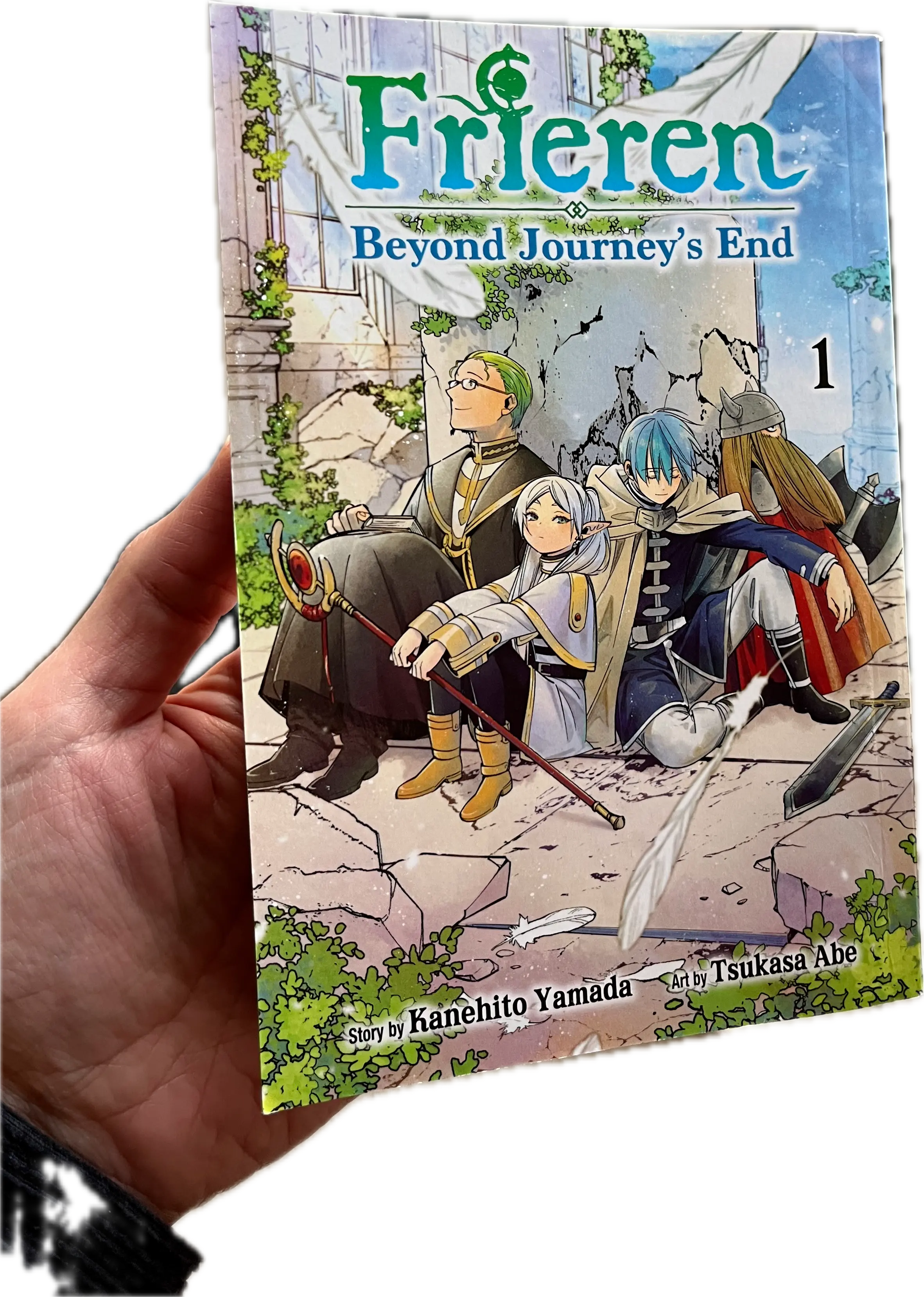 A hand holding a book, Frieren: Beyond Journey's End, Vol. 1