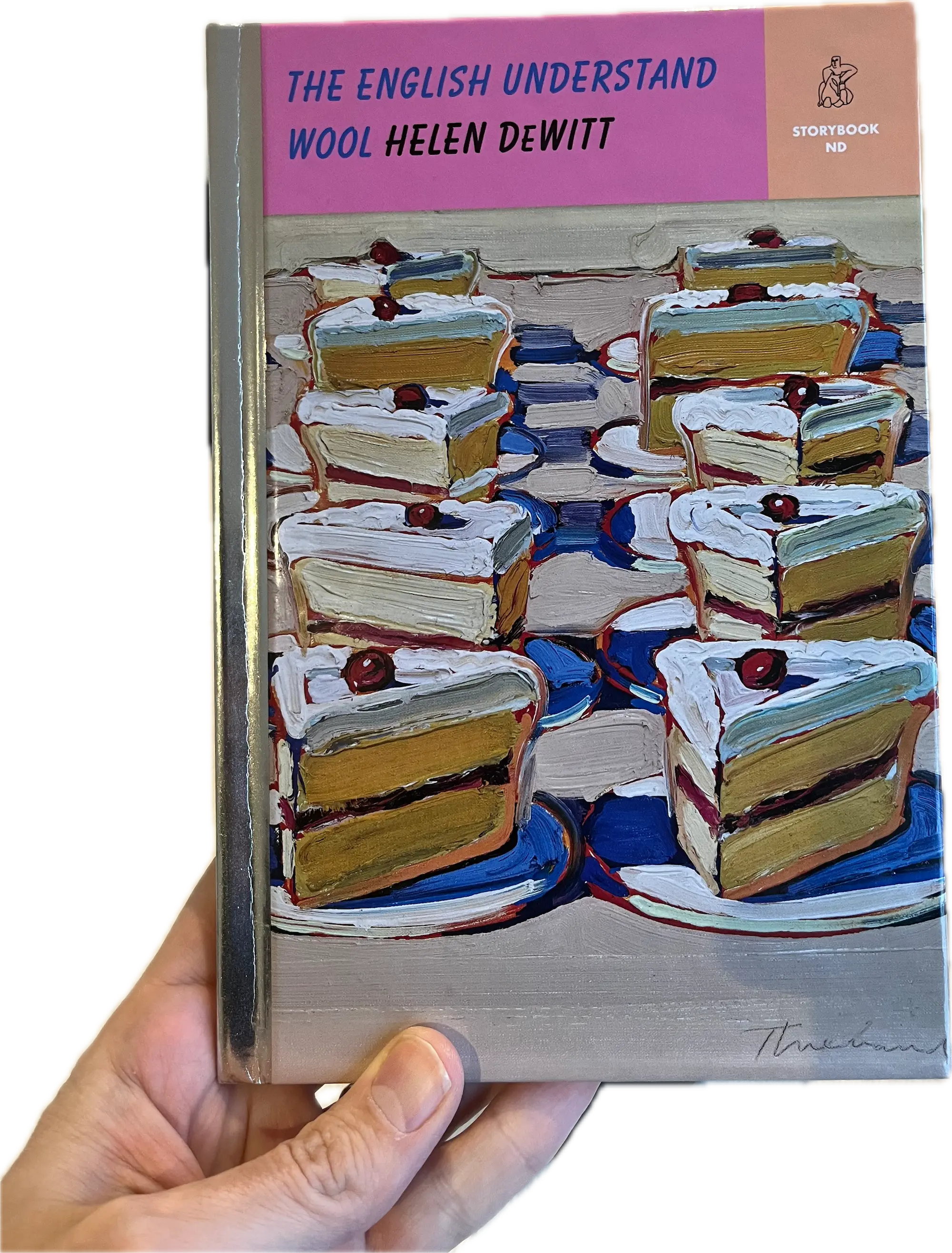A hand holding a book, The English Understand Wool